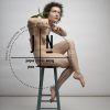 Alice seated/white