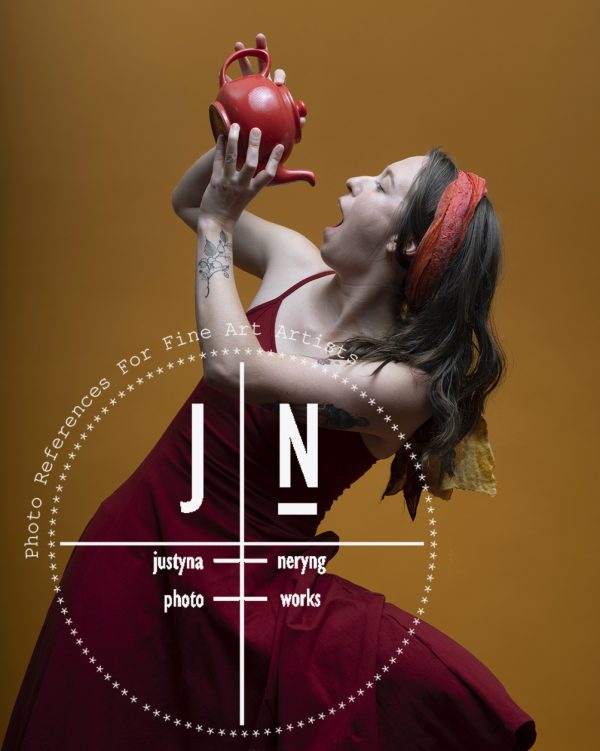 Daelyn with red teapot /16 shots